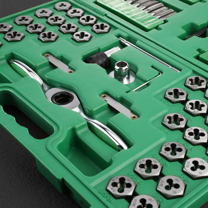 Green tool kit with various metallic tools and components on a dark background