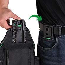 Person wearing a tool belt with multiple pouches and attachments on a white background