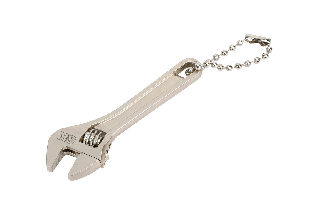 Metal adjustable wrench keychain on a white background